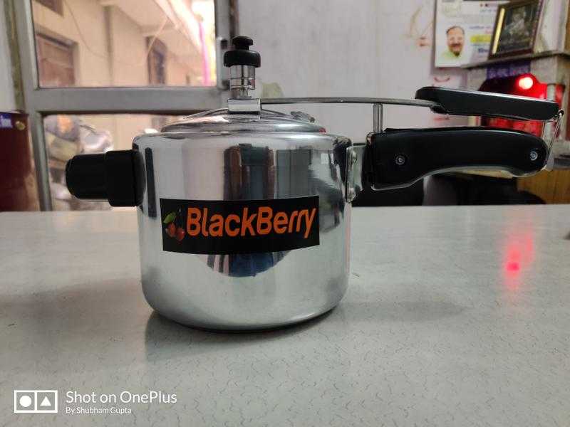 Whistle cooker price sales