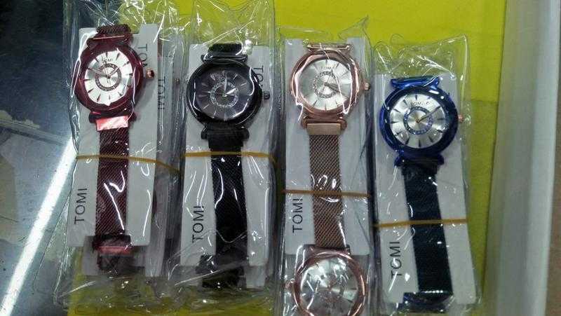 Tomi sales magnet watch